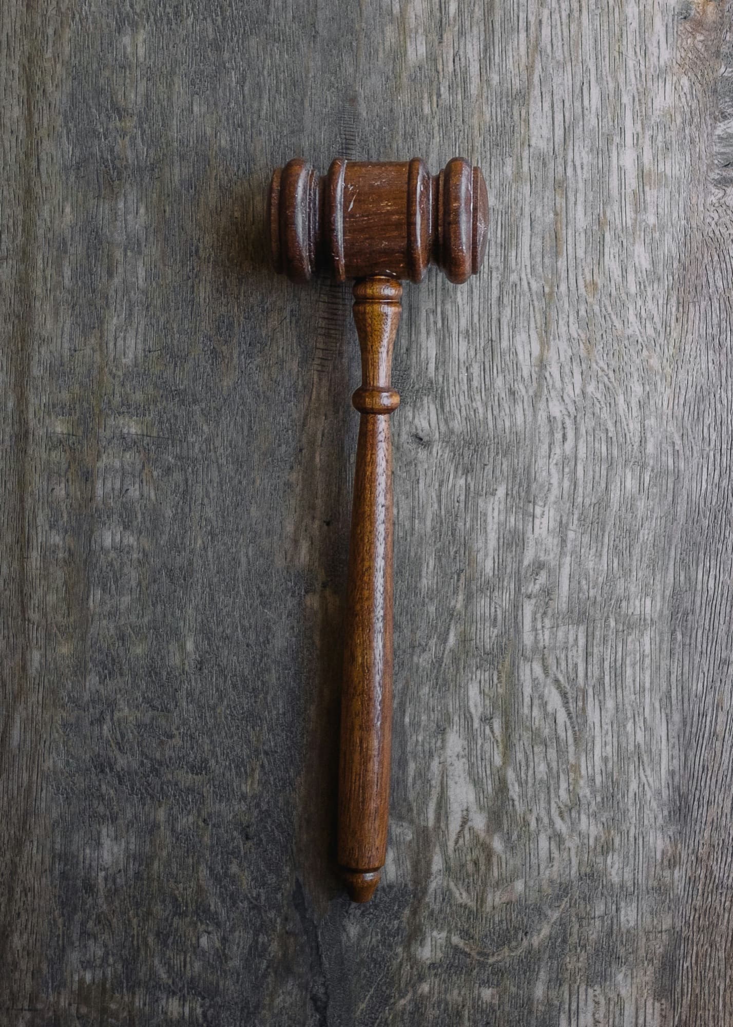 Wooden gavel resting on a table